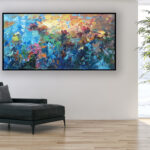 Floral oil painting on canvas adding elegance to a bright living room with a black leather sofa