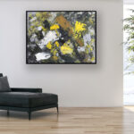 Abstract painting, original oil painting on canvas hanging in a modern living room with a black sofa and home decor