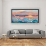 Abstract sunset painting, original oil painting on canvas hanging in a modern living room with a gray sofa