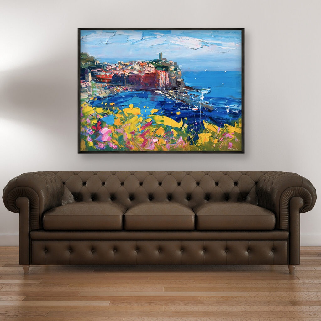 Vernazza Cinque Terre painting, original oil painting on canvas hanging in a modern living room with a brown sofa and home decor