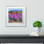 Lavender field oil painting on canvas, original modern textured floral wall art, framed, perfect for living room wall decor and as unique gift for her, displayed on the wall above a chest of drawers in a stylish living room