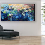 Water Lilies painting, original oil painting on canvas hanging in a modern living room with a black sofa