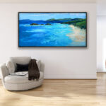 Beach painting, original oil painting on canvas hanging in a modern living room with a beige sofa