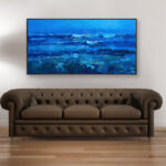 Blue ocean painting, original oil painting on canvas hanging in a modern living room with a brown sofa