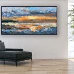 Sunset painting, original oil painting on canvas hanging in a modern living room with a black sofa