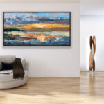 Sunset painting, original oil painting on canvas hanging in a modern living room with a beige sofa