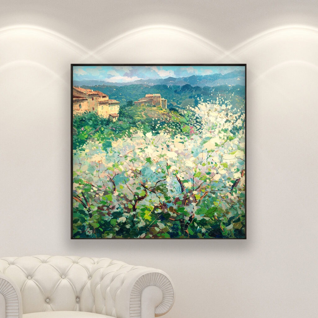 Tuscan Blooming Trees Landscape Painting on Canvas hanging in a modern living room with a white sofa and home decor